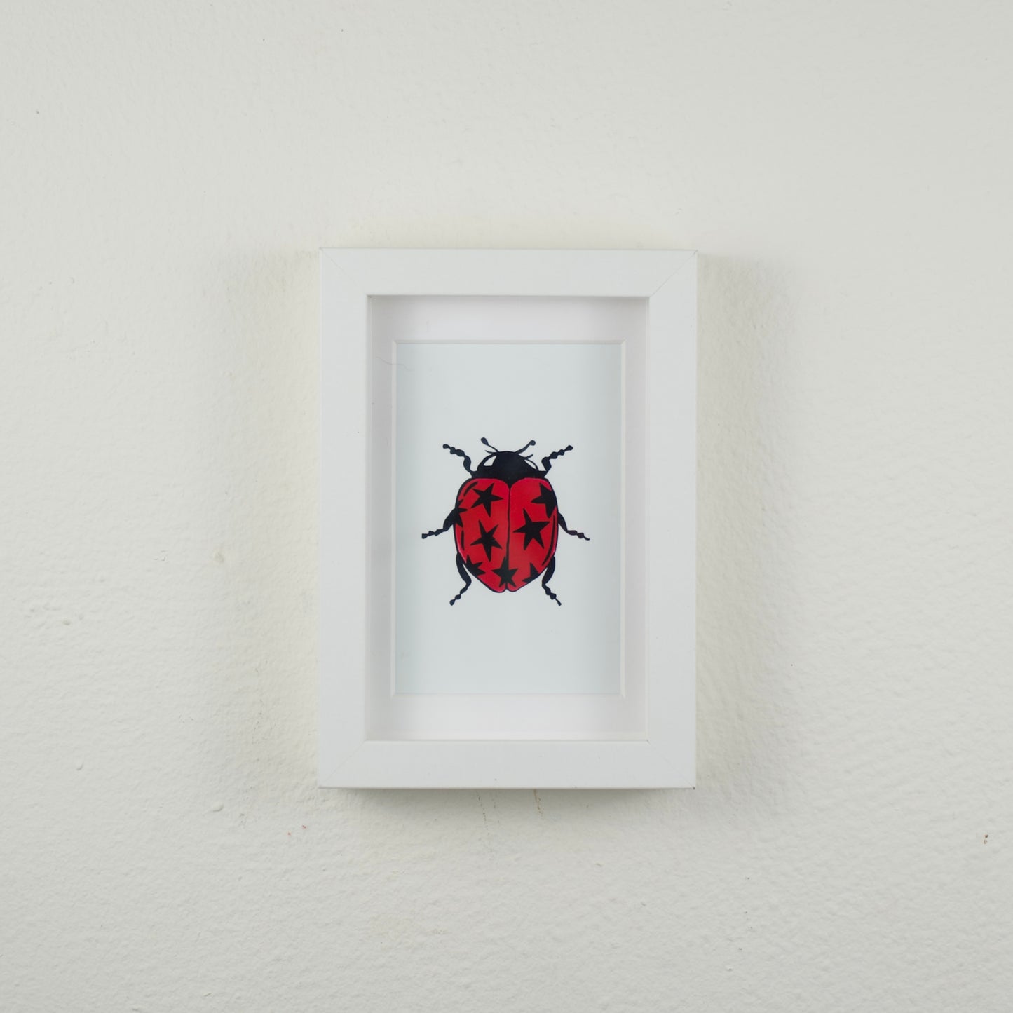 Star Ladybug — Framed Art Print